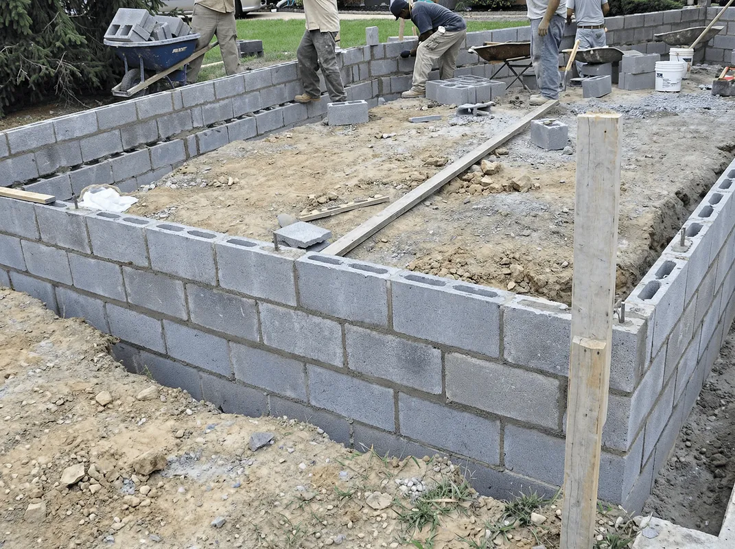 Professionals building a foundation with blocks in Chattanooga, TN